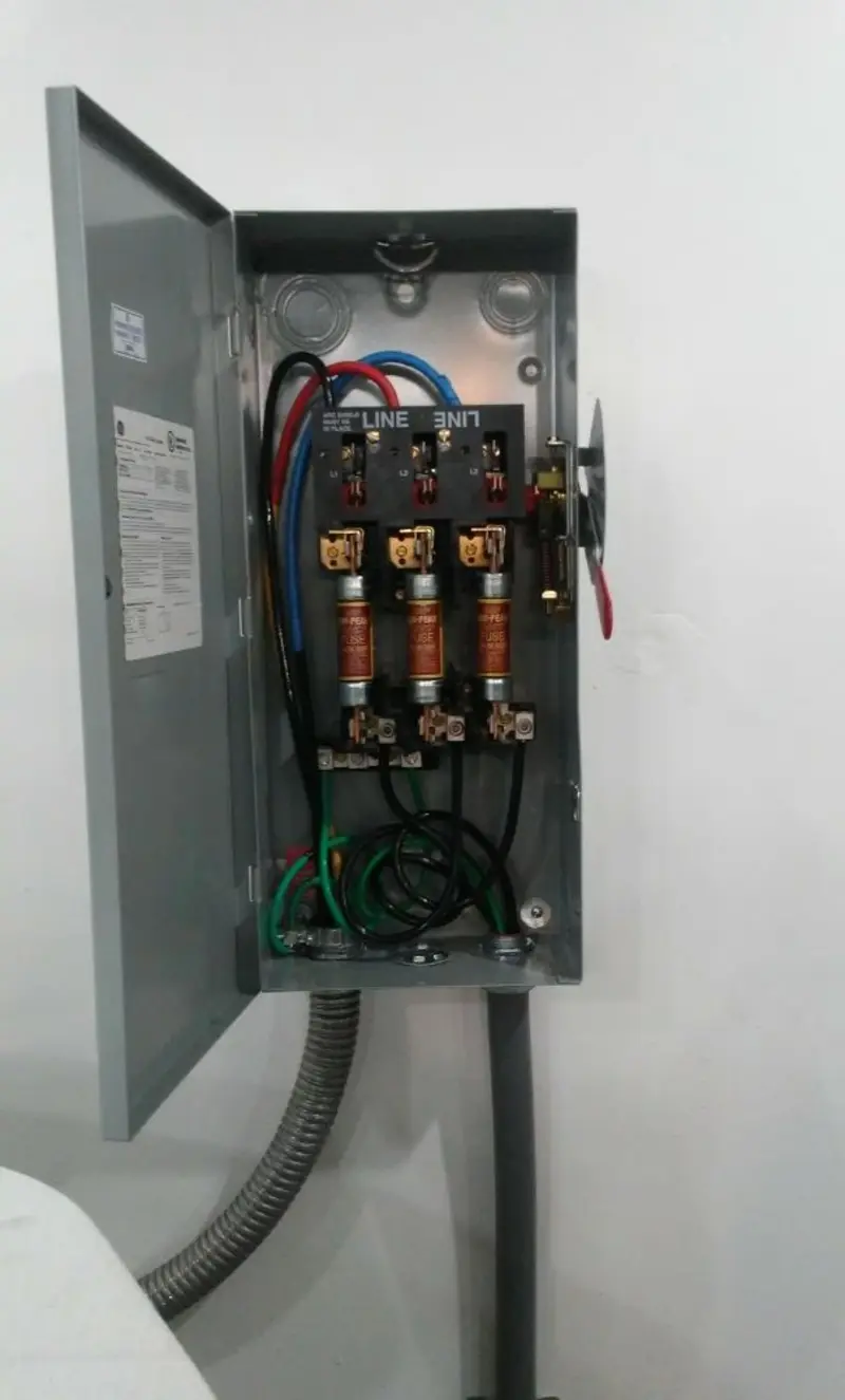 Three-phase disconnect switch installed for Smoke Detector Installation in Westwood